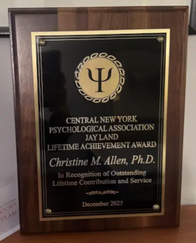 Jay Land Lifetime Achievement Award plaque presented to Dr. Christine Allen by the Central New York Psychological Association